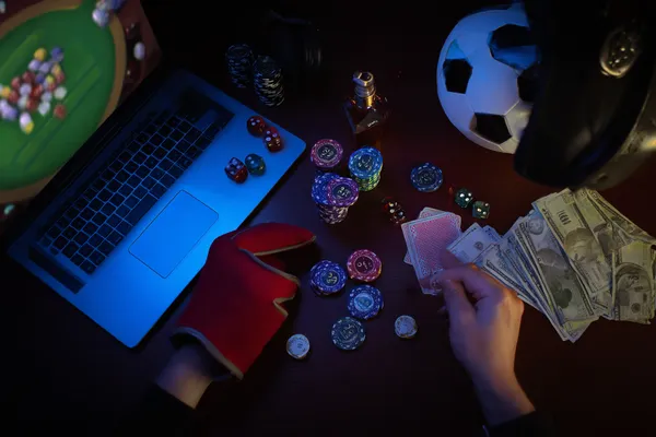 GOOD111 Live Games — Take part in high-energy casino action A glowing roulette wheel with cascading chips, symbolizing the engaging live and instant-win games available on GOOD111.